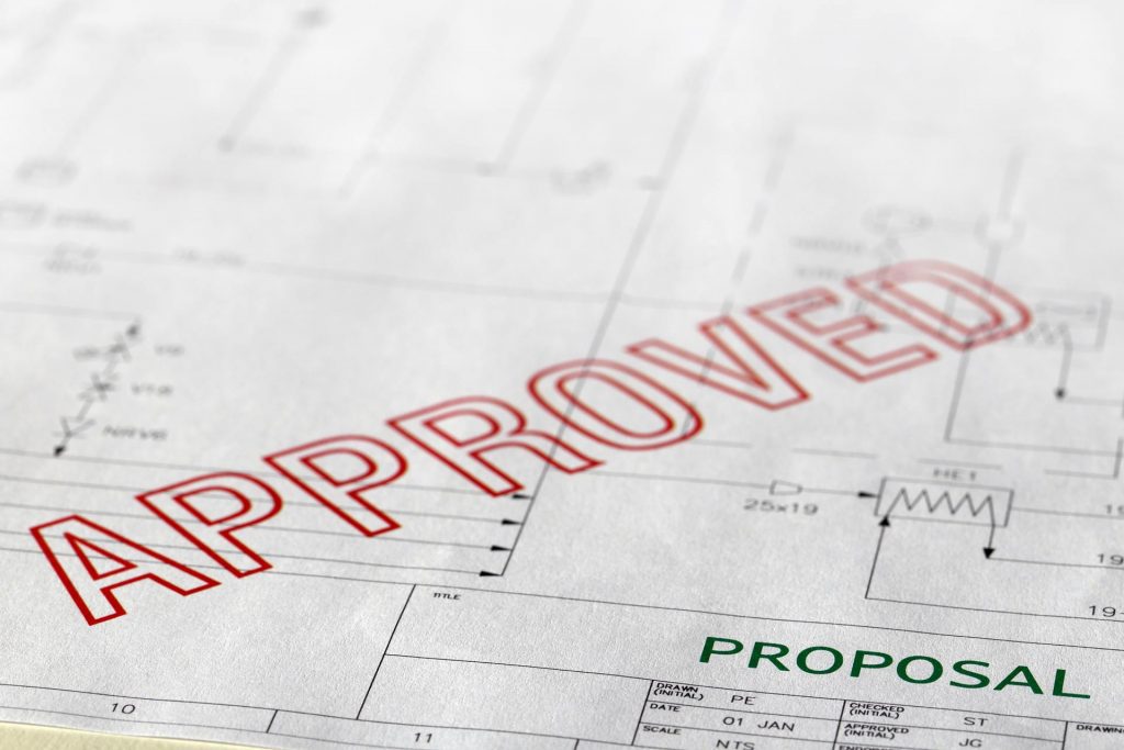 approved stamp on proposal paper